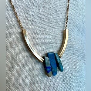 22’ long Pendant necklace with turquoise like rock and gold metal